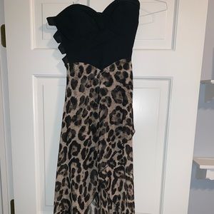 Asymmetrical, cut out leopard dress. Size small.